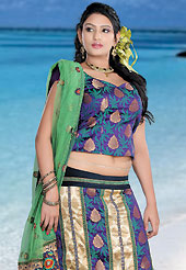 Elegance and innovation of designs crafted for you. This light fawn and purple brocade lehenga choli is nicely embroidered patch work done with  resham, sequins and lace work. Embroidery work on lehenga is stunning. The beautiful embroidery on lehenga made it awesome and gives you stylish and attractive look to others. Matching choli and light green net dupatta is availble with this lehenga. Slight Color variations are possible due to differing screen and photograph resolutions.