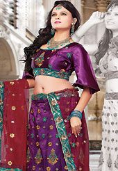 Take a look on the changing fashion of the season. This dark purple net lehenga choli is nicely embroidered and patch work done with resham and sequins work in form of floral motifs. The beautiful embroidery on lehenga made it awesome and gives you stylish and attractive look to others. Matching choli and red net dupatta is availble with this lehenga. Slight Color variations are possible due to differing screen and photograph resolutions.