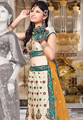 Today’s fashion is really about sensuality which can be seen in this creation. This cream net lehenga choli is nicely embroidered and patch work done with resham and sequins work in form of floral motifs. The beautiful embroidery on lehenga made it awesome and gives you stylish and attractive look to others. Matching choli and light orange net dupatta is availble with this lehenga. Slight Color variations are possible due to differing screen and photograph resolutions.
