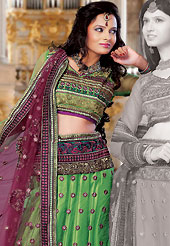 Embroidered lehengas are highly in order on a range of occasions such as wedding, formal party and festivals. This green net lehenga choli is nicely embroidered and patch work done with resham and sequins work. The beautiful embroidery on lehenga made it awesome and gives you stylish and attractive look to others. Matching choli and burgundy net dupatta is availble with this lehenga. Slight Color variations are possible due to differing screen and photograph resolutions.