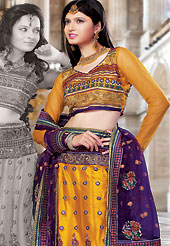 Welcome to the new era of Indian fashion wear. This orange net lehenga choli is nicely embroidered and patch work done with resham and sequins work in form of floral motifs. The beautiful embroidery on lehenga made it awesome and gives you stylish and attractive look to others. Matching choli and deep purple net dupatta is availble with this lehenga. Slight Color variations are possible due to differing screen and photograph resolutions.