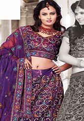 Make your collection more attractive and charming with this impressive dress. This dark purple net lehenga choli is nicely embroidered and patch work done with resham and sequins work. The beautiful embroidery on lehenga made it awesome and gives you stylish and attractive look to others. Matching choli and dupatta is availble with this lehenga. Slight Color variations are possible due to differing screen and photograph resolutions.