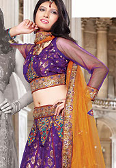 Today’s fashion is really about sensuality which can be seen in this creation. This dark purple brocade and net lehenga choli is nicely embroidered and patch work done with resham and sequins work. The beautiful embroidery on lehenga made it awesome and gives you stylish and attractive look to others. Matching choli and contrasting orange net dupatta is availble with this lehenga. Slight Color variations are possible due to differing screen and photograph resolutions.