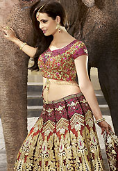 Elegance and innovation of designs crafted for you. This maroon lehenga choli is nicely embroidered and patch work done with resham, heavy zari, sequins and stone work in form of floral motifs. The beautiful embroidery on lehenga made it awesome and gives you stylish and attractive look to others. Contrasting rust embroidery work choli and matching dupatta is availble with this lehenga. Slight Color variations are possible due to differing screen and photograph resolutions.