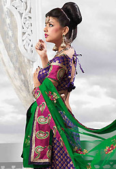 An occasion wear perfect is ready to rock you. This purple art silk lehenga is nicely embroidered patch work is done with resham, zari, sequins, stone and lace work. The beautiful embroidery on lehenga made it awesome and gives you stylish and attractive look to others. Matching choli and green net dupatta is availble with this lehenga. Slight Color variations are possible due to differing screen and photograph resolutions.