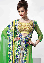 Outfit is a novel ways of getting yourself noticed. This light cream and green net jacket style lehenga is nicely embroidered patch work is done with resham, zari, sequins, stone, beads and lace work. The beautiful embroidery on lehenga made it awesome and gives you stylish and attractive look to others. Contrasting yellow art silk choli, green jacket and green net dupatta is availble with this lehenga. Slight Color variations are possible due to differing screen and photograph resolutions.