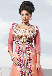 Be the cynosure of all eyes with this wonderful casual wear in flattering colors and combinations. This fawn and pink net jacket style lehenga is nicely embroidered patch work is done with resham, zari, sequins, stone, beads and lace work. The beautiful embroidery on lehenga made it awesome and gives you stylish and attractive look to others. Contrasting off white art silk choli, pink jacket and pink net dupatta is availble with this lehenga. Slight Color variations are possible due to differing screen and photograph resolutions.