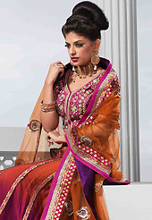 Make your collection more attractive and charming with this impressive dress. This shaded orange and pink net lehenga is nicely embroidered patch work is done with resham, zari, sequins, stone, kundana and lace work. The beautiful embroidery on lehenga made it awesome and gives you stylish and attractive look to others. Matching pink art silk choli and orange net dupatta is availble with this lehenga. Slight Color variations are possible due to differing screen and photograph resolutions.