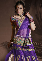 The evolution of style species collection spells pure femininity. This purple net lehenga is nicely embroidered patch work is done with resham, zari, sequins, stone and lace work. The beautiful embroidery on lehenga made it awesome and gives you stylish and attractive look to others. Matching choli and net dupatta is availble with this lehenga. Slight Color variations are possible due to differing screen and photograph resolutions.