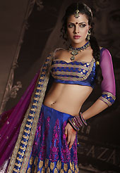 Bold colors created by the inventive drapes of textile catch the imagination like no other contemporary clothing. This blue net lehenga is nicely embroidered patch work is done with resham, zari, sequins, stone and lace work. The beautiful embroidery on lehenga made it awesome and gives you stylish and attractive look to others. Matching choli and dark magenta net dupatta is availble with this lehenga. Slight Color variations are possible due to differing screen and photograph resolutions.