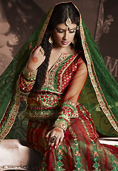No one like ordinary look, because every woman has their own beauty and our collection gives extra ordinary look to you. This dark red and green net lehenga is nicely embroidered patch work is done with resham, zari, sequins, stone and lace work. The beautiful embroidery on lehenga made it awesome and gives you stylish and attractive look to others. Matching choli and green net dupatta is availble with this lehenga. Slight Color variations are possible due to differing screen and photograph resolutions.