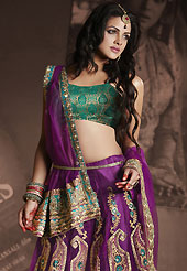 Welcome to the new era of Indian fashion wear. This purple net lehenga is nicely embroidered patch work is done with resham, zari, sequins, stone and lace work. The beautiful embroidery on lehenga made it awesome and gives you stylish and attractive look to others. Contrasting brown choli and purple net dupatta is availble with this lehenga. Slight Color variations are possible due to differing screen and photograph resolutions.