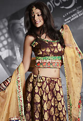 Today’s fashion is really about sensuality which can be seen in this creation. This maroon net and viscose lehenga is nicely embroidered patch work is done with resham, zari, sequins, stone and lace work. The beautiful embroidery on lehenga made it awesome and gives you stylish and attractive look to others. Matching choli and light fawn net dupatta is availble with this lehenga. Slight Color variations are possible due to differing screen and photograph resolutions.
