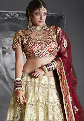 Elegance and innovation of designs crafted for you. This cream and Light grey net lehenga is nicely embroidered patch work is done with resham, zari, sequins, stone and lace work. The beautiful embroidery on lehenga made it awesome and gives you stylish and attractive look to others. Contrasting maroon embroidered work choli and maroon net dupatta is availble with this lehenga. Slight Color variations are possible due to differing screen and photograph resolutions.