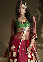 The evolution of style species collection spells pure femininity. This dark red lehenga is nicely embroidered patch work is done with resham, zari, sequins, stone and lace work. The beautiful embroidery on lehenga made it awesome and gives you stylish and attractive look to others. Contrasting green and dark red long choli and beige net dupatta is availble with this lehenga. Slight Color variations are possible due to differing screen and photograph resolutions.