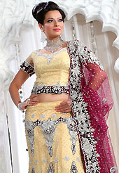 Embroidered lehengas are highly in order on a range of occasions such as wedding, formal party and festivals. This cream net lehenga is nicely embroidered patch work is done with stone, zardosi and cutbeads work. The beautiful embroidery on lehenga made it awesome and gives you stylish and attractive look to others. Matching choli and pink net dupatta is availble with this lehenga. Slight Color variations are possible due to differing screen and photograph resolutions.