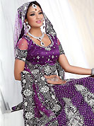It’s cool and has a very modern look to impress all. This purple net lehenga is nicely embroidered and velvet patch work is done with stone, zardosi, cutdana and cutbeads work. The beautiful embroidery on lehenga made it awesome and gives you stylish and attractive look to others. Matching choli and dupatta is availble with this lehenga. Slight Color variations are possible due to differing screen and photograph resolutions.