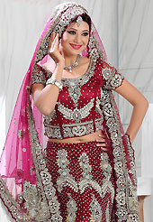 Elegance and innovation of designs crafted for you. This maroon net lehenga is nicely embroidered and velvet patch work is done with stone, zardosi, cutdana and cutbeads work. The beautiful embroidery on lehenga made it awesome and gives you stylish and attractive look to others. Matching choli and pink net dupatta is availble with this lehenga. Slight Color variations are possible due to differing screen and photograph resolutions.