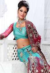 Be the cynosure of all eyes with this wonderful casual wear in flattering colors and combinations. This blue and dark pink net lehenga is nicely embroidered and velvet patch work is done with stone, zardosi, cutdana and cutbeads work. The beautiful embroidery on lehenga made it awesome and gives you stylish and attractive look to others. Matching choli and dupatta is availble with this lehenga. Slight Color variations are possible due to differing screen and photograph resolutions.