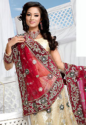 Elegance and innovation of designs crafted for you. This cream net lehenga is nicely embroidered and velvet patch work is done with stone, zardosi, cutdana and cutbeads work. The beautiful embroidery on lehenga made it awesome and gives you stylish and attractive look to others. Matching choli and dark red net dupatta is availble with this lehenga. Slight Color variations are possible due to differing screen and photograph resolutions.