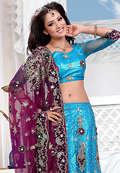Make your collection more attractive and charming with this impressive dress. This blue net lehenga is nicely embroidered and velvet patch work is done with stone, zardosi, cutdana and cutbeads work. The beautiful embroidery on lehenga made it awesome and gives you stylish and attractive look to others. Matching choli and burgundy net dupatta is availble with this lehenga. Slight Color variations are possible due to differing screen and photograph resolutions.