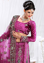 Welcome to the new era of Indian fashion wear. This dark magenta velvet lehenga is nicely embroidered patch work is done with stone, zardosi, cutdana and cutbeads work. The beautiful embroidery on lehenga made it awesome and gives you stylish and attractive look to others. Matching choli and dupatta is availble with this lehenga. Slight Color variations are possible due to differing screen and photograph resolutions.