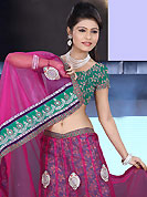 Be the cynosure of all eyes with this wonderful casual wear in flattering colors and combinations. This dark pink net lehenga is nicely embroidered patch work is done with resham, zari, sequins, stone and lace work. The beautiful embroidery on lehenga made it awesome and gives you stylish and attractive look to others. Contrasting green choli and dark pink net dupatta is availble with this lehenga. Slight Color variations are possible due to differing screen and photograph resolutions.