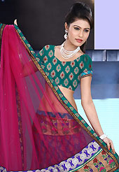 It’s cool and has a very modern look to impress all. This hot pink and teal green net and brocade lehenga is nicely embroidered patch work is done with resham, zari, sequins, stone and lace work. The beautiful embroidery on lehenga made it awesome and gives you stylish and attractive look to others. Matching teal green choli and hot pink net dupatta is availble with this lehenga. Slight Color variations are possible due to differing screen and photograph resolutions.