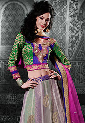 This season dazzle and shine in pure colors. This off white net a-line lehenga choli is nicely embroidered patch border is done with resham, zari, stone and lace work. The beautiful embroidery on lehenga made it awesome and gives you stylish and attractive look to others. Contrasting green and purple art silk and brocade choli and net dupatta is availble with this lehenga. Slight Color variations are possible due to differing screen and photograph resolutions.