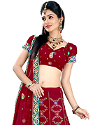 Outfit is a novel ways of getting yourself noticed. This dark red faux georgette lehenga is nicely embroidered patch work is done with resham, zari, sequins and stone work. The beautiful embroidery on lehenga made it awesome and gives you stylish and attractive look to others. Matching choli and dupatta is availble with this lehenga. Slight Color variations are possible due to differing screen and photograph resolutions.