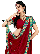 No one like ordinary look, because every woman has their own beauty and our collection gives extra ordinary look to you. This maroon faux georgette lehenga is nicely embroidered patch work is done with resham, zari, sequins and stone work. The beautiful embroidery on lehenga made it awesome and gives you stylish and attractive look to others. Matching choli and dupatta is availble with this lehenga. Slight Color variations are possible due to differing screen and photograph resolutions.