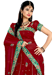 Today’s fashion is really about sensuality which can be seen in this creation. This dark red faux georgette lehenga is nicely embroidered patch work is done with resham, zari, sequins and stone work. The beautiful embroidery on lehenga made it awesome and gives you stylish and attractive look to others. Matching choli and dupatta is availble with this lehenga. Slight Color variations are possible due to differing screen and photograph resolutions.