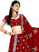 Make your collection more attractive and charming with this impressive dress. This maroon faux georgette lehenga is nicely embroidered patch work is done with resham, zari, sequins and stone work. The beautiful embroidery on lehenga made it awesome and gives you stylish and attractive look to others. Matching choli and dupatta is availble with this lehenga. Slight Color variations are possible due to differing screen and photograph resolutions.