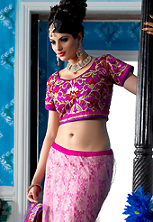 Elegance and innovation of designs crafted for you. This pink net a-line lehenga choli is nicely embroidered patch border is done with resham, zari, sequins, stone and lace work. The beautiful embroidery on lehenga made it awesome and gives you stylish and attractive look to others. Contrasting magenta choli and purple net dupatta is availble with this lehenga. Slight Color variations are possible due to differing screen and photograph resolutions.