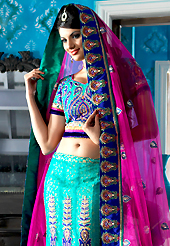 An occasion wear perfect is ready to rock you. This aqua blue net a-line lehenga choli is nicely embroidered patch border is done with resham, zari, sequins, stone and lace work. The beautiful embroidery on lehenga made it awesome and gives you stylish and attractive look to others. Matching choli and dark pink net dupatta is availble with this lehenga. Slight Color variations are possible due to differing screen and photograph resolutions.