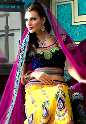 The traditional patterns used on this lehenga maintain the ethnic look. This yellow net a-line lehenga choli is nicely embroidered patch border is done with resham, zari, sequins, stone, beads and lace work. The beautiful embroidery on lehenga made it awesome and gives you stylish and attractive look to others. Contrasting navy blue velvet choli and dark pink net dupatta is availble with this lehenga. Slight Color variations are possible due to differing screen and photograph resolutions.
