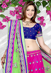 Be the cynosure of all eyes with this wonderful casual wear in flattering colors and combinations. This pink net a-line lehenga is nicely embroidered patch work is done with resham, sequins, stone and lace work. The beautiful embroidery on lehenga made it awesome and gives you stylish and attractive look to others. Contrasting blue choli and light green net dupatta is availble with this lehenga. Slight Color variations are possible due to differing screen and photograph resolutions.