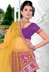 Make your collection more attractive and charming with this impressive dress. This purple net lehenga is nicely embroidered patch work is done with resham, zari, stone and lace work. The beautiful embroidery on lehenga made it awesome and gives you stylish and attractive look to others. Matching choli and yellow net dupatta is availble with this lehenga. Slight Color variations are possible due to differing screen and photograph resolutions.