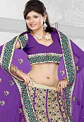 It’s cool and has a very modern look to impress all. This purple and dark cream art silk lehenga is nicely embroidered patch work is done with resham, zari, sequins, stone and lace work. The beautiful embroidery on lehenga made it awesome and gives you stylish and attractive look to others. Matching choli and dupatta is availble with this lehenga. Slight Color variations are possible due to differing screen and photograph resolutions.