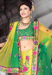Elegance and innovation of designs crafted for you. This yellow and green net lehenga is nicely embroidered patch work is done with resham, sequins and stone work. The beautiful embroidery on lehenga made it awesome and gives you stylish and attractive look to others. Matching choli and dupatta is availble with this lehenga. Slight Color variations are possible due to differing screen and photograph resolutions.