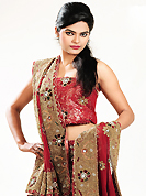 Elegance and innovation of designs crafted for you. This dark red georgette lehenga is nicely embroidered patch work is done with sequins, stone, beads and cutbeads work. The beautiful embroidery on lehenga made it awesome and gives you stylish and attractive look to others. Matching choli and dupatta is availble with this lehenga. Slight Color variations are possible due to differing screen and photograph resolutions.