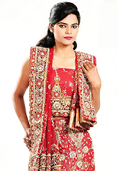 Make your collection more attractive and charming with this impressive dress. This red net lehenga is nicely embroidered and velvet patch work is done with cutdana, sequins, stone, beads and cutbeads work. The beautiful embroidery on lehenga made it awesome and gives you stylish and attractive look to others. Matching choli and dupatta is availble with this lehenga. Slight Color variations are possible due to differing screen and photograph resolutions.