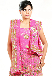 Make your collection more attractive and charming with this impressive dress. This pink net lehenga is nicely embroidered patch work is done with zardosi, cutdana, sequins, stone, beads and cutbeads work. The beautiful embroidery on lehenga made it awesome and gives you stylish and attractive look to others. Matching choli and dupatta is availble with this lehenga. Slight Color variations are possible due to differing screen and photograph resolutions.