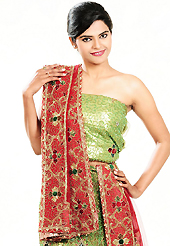 Be the cynosure of all eyes with this wonderful casual wear in flattering colors and combinations. This light green net lehenga is nicely embroidered patch work is done with zardosi, cutdana, stone, beads and cutbeads work. The beautiful embroidery on lehenga made it awesome and gives you stylish and attractive look to others. Matching choli and red net dupatta is availble with this lehenga. Slight Color variations are possible due to differing screen and photograph resolutions.