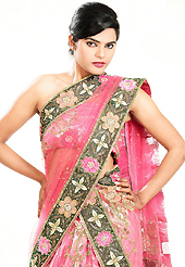 Let your personality speak for you this wedding lehenga embellished with embroidery work. This pink net lehenga is nicely embroidered and velvet patch work is done with cutdana, sequins, stone, beads and cutbeads work. The beautiful embroidery on lehenga made it awesome and gives you stylish and attractive look to others. Matching choli and red net dupatta is availble with this lehenga. Slight Color variations are possible due to differing screen and photograph resolutions.