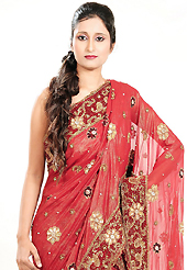 Bold colors created by the inventive drapes of textile catch the imagination like no other contemporary clothing. This red georgette lehenga is nicely embroidered patch work is done with cutdana, stone, beads and cutbeads work. The beautiful embroidery on lehenga made it awesome and gives you stylish and attractive look to others. Matching choli and dupatta is availble with this lehenga. Slight Color variations are possible due to differing screen and photograph resolutions.