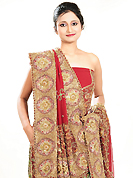 Welcome to the new era of Indian fashion wear. This dark red georgette lehenga is nicely embroidered patch work is done with zardosi, cutdana, stone, beads and cutbeads work. The beautiful embroidery on lehenga made it awesome and gives you stylish and attractive look to others. Matching choli and dupatta is availble with this lehenga. Slight Color variations are possible due to differing screen and photograph resolutions.