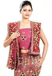 Be the cynosure of all eyes with this wonderful casual wear in flattering colors and combinations. This dark pink georgette lehenga is nicely embroidered and velvet patch work is done with zardosi, cutdana, stone, beads and cutbeads work. The beautiful embroidery on lehenga made it awesome and gives you stylish and attractive look to others. Matching choli and red net dupatta is availble with this lehenga. Slight Color variations are possible due to differing screen and photograph resolutions.