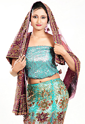 An occasion wear perfect is ready to rock you. This light blue net lehenga is nicely embroidered and velvet patch work is done with zardosi, cutdana, stone, beads and cutbeads work. The beautiful embroidery on lehenga made it awesome and gives you stylish and attractive look to others. Matching choli and burgundy net dupatta is availble with this lehenga. Slight Color variations are possible due to differing screen and photograph resolutions.