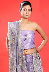 Be the cynosure of all eyes with this wonderful casual wear in flattering colors and combinations. This light purple tissue lehenga is nicely embroidered patch work is done with zardosi, cutdana, sequins, stone, beads and cutbeads work. The beautiful embroidery on lehenga made it awesome and gives you stylish and attractive look to others. Matching choli and dupatta is availble with this lehenga. Slight Color variations are possible due to differing screen and photograph resolutions.